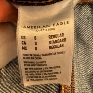 Dunham washed out blue, 2 holes in knee area, stretch waistline